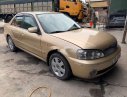 Ford Laser   2003 - Cần bán gấp Ford Laser sản xuất năm 2003, màu vàng