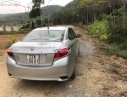 Toyota Vios 1.5E 2014 - Cần bán Toyota Vios E 2014, màu bạc chính chủ, giá tốt