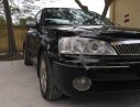 Ford Laser Ghia 1.8 MT 2003 - Cần bán gấp Ford Laser GHIA 1.8 MT năm 2003, màu đen, 132tr