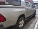 Toyota Hilux 2.4E 4x2 MT 2017 - Bán Toyota Hilux 2.4E 4x2 MT đời 2017, màu bạc, nhập khẩu nguyên chiếc còn mới