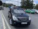 Kia Carens   2009 - Cần bán gấp Kia Carens sản xuất năm 2009, màu đen số tự động, 285tr