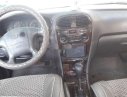 Hyundai Sonata    1999 - Cần bán xe Hyundai Sonata 1999, màu trắng, nhập khẩu nguyên chiếc xe gia đình