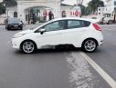 Ford Fiesta 2011 - Cần bán gấp Ford Fiesta sản xuất 2011, màu trắng số tự động, 298tr