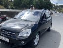 Kia Carens   2009 - Cần bán gấp Kia Carens sản xuất năm 2009, màu đen số tự động, 285tr