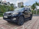 Toyota Fortuner 2015 - Bán Toyota Fortuner G sản xuất 2015, màu đen, số sàn