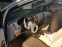 Toyota Innova E 2015 - Cần bán gấp Toyota Innova E sản xuất năm 2015, màu bạc