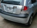 Hyundai Getz 2009 - Cần bán gấp Hyundai Getz đời 2009, màu bạc  