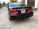 Toyota Camry 2.4G 2004 - Bán Toyota Camry 2.4G đời 2004, màu đen số sàn