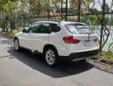 BMW X1 sDrive18i 2011 - Cần bán BMW X1 sDrive18i sản xuất năm 2011, màu trắng, nhập khẩu nguyên chiếc còn mới