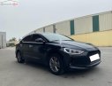 Hyundai Elantra 2018 - Cần bán lại xe Hyundai Elantra sản xuất 2018, màu đen, 592tr