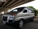 Hyundai Grand Starex   2004 - Bán Hyundai Grand Starex đời 2004, màu bạc, nhập khẩu, xe gia đình