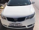 Kia Forte   2010 - Cần bán gấp Kia Forte sản xuất năm 2010, màu trắng số tự động, 334tr