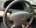 Toyota Camry 2.4G 2004 - Bán Toyota Camry 2.4G đời 2004, màu đen số sàn