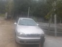 Daewoo Lanos SX 2004 - Cần bán gấp Daewoo Lanos SX đời 2004, màu bạc