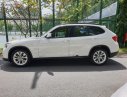 BMW X1 sDrive18i 2011 - Cần bán BMW X1 sDrive18i sản xuất năm 2011, màu trắng, nhập khẩu nguyên chiếc còn mới