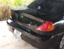 Kia Spectra 2003 - Cần bán lại xe Kia Spectra 1.6 MT đời 2003, màu đen