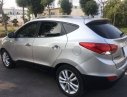 Hyundai Tucson 2011 - Cần bán lại xe Hyundai Tucson sản xuất năm 2011, màu bạc số tự động