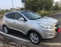 Hyundai Tucson 2011 - Cần bán lại xe Hyundai Tucson sản xuất năm 2011, màu bạc số tự động