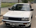 Nissan Bluebird 1.8   1990 - Cần bán Nissan Bluebird 1.8 đời 1990, màu trắng, xe nhập số sàn