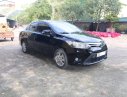 Toyota Vios 1.5E 2015 - Cần bán Toyota Vios 1.5E sản xuất năm 2015, màu đen xe gia đình