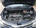 Toyota Vios 1.5E 2015 - Cần bán Toyota Vios 1.5E sản xuất năm 2015, màu đen xe gia đình