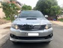 Toyota Fortuner 2.5G 2014 - Bán Toyota Fortuner MT sản xuất 2014, màu bạc xe gia đình 