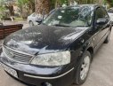 Ford Laser   2005 - Cần bán lại xe Ford Laser 1.8 AT đời 2005, màu đen 