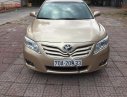 Toyota Camry LE 2.5 2009 - Cần bán xe Toyota Camry LE 2.5 sản xuất năm 2009, màu vàng, xe nhập