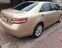 Toyota Camry LE 2.5 2009 - Cần bán xe Toyota Camry LE 2.5 sản xuất năm 2009, màu vàng, xe nhập