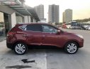 Hyundai Tucson 2.0AT 2011 - Cần bán gấp Hyundai Tucson 2.0AT năm 2011, màu đỏ, xe nhập số tự động