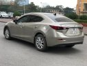 Mazda 3 2016 - Cần bán gấp Mazda 3 sản xuất năm 2016, màu vàng