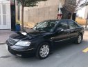 Ford Mondeo 2003 - Cần bán xe cũ Ford Mondeo 2.5 AT đời 2003, màu đen