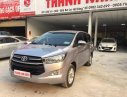 Toyota Innova 2.0E 2018 - Cần bán gấp Toyota Innova 2.0E năm 2018, màu bạc số sàn