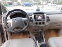 Toyota Innova 2.0E 2014 - Bán Toyota Innova 2.0 E đời 2014, màu vàng số sàn