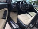 Kia Cerato 2016 - Cần bán xe Kia Cerato 1.6 AT năm sản xuất 2016, màu đen, 553tr