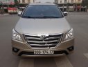 Toyota Innova 2.0E 2014 - Bán Toyota Innova 2.0 E đời 2014, màu vàng số sàn