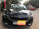 Kia Cerato 2016 - Cần bán xe Kia Cerato 1.6 AT năm sản xuất 2016, màu đen, 553tr