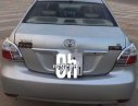 Toyota Vios  E  2009 - Cần bán gấp Toyota Vios E đời 2009, màu bạc xe gia đình