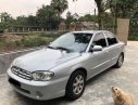 Kia Spectra 2004 - Cần bán gấp Kia Spectra năm 2004, màu bạc xe gia đình, 95tr