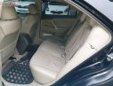 Toyota Camry   2011 - Cần bán Toyota Camry 2.4G 2011, màu đen, giá 575tr