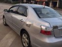 Toyota Vios  E  2009 - Cần bán gấp Toyota Vios E đời 2009, màu bạc xe gia đình