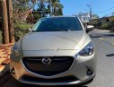 Mazda 2 2016 - Cần bán Mazda 2 2016, màu vàng, 450tr