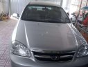 Daewoo Lacetti 2010 - Cần bán Daewoo Lacetti sản xuất 2010, màu bạc