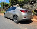 Mazda 2 2016 - Cần bán Mazda 2 2016, màu vàng, 450tr