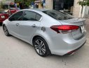 Kia Cerato   2017 - Cần bán Kia Cerato Signature 1.6 AT đời 2017, màu bạc, chính chủ 