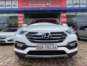 Hyundai Santa Fe 2016 - Cần bán gấp Hyundai Santa Fe sản xuất 2016, màu trắng số tự động, giá tốt