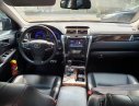 Toyota Camry 2016 - Cần bán lại xe Toyota Camry sản xuất năm 2016, màu đen mới 98%, giá chỉ 895 triệu