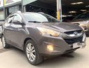 Hyundai Tucson 2011 - Cần bán xe Hyundai Tucson sản xuất năm 2011, màu xám, nhập khẩu, giá tốt