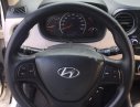 Hyundai Grand i10 2015 - Cần bán gấp Hyundai Grand i10 đời 2015, màu trắng, nhập khẩu