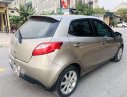 Mazda 2 2014 - Bán xe Mazda 2 đời 2014, màu vàng